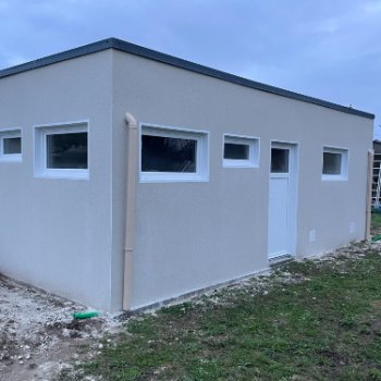 Garage en béton enduit Toit Terrasse